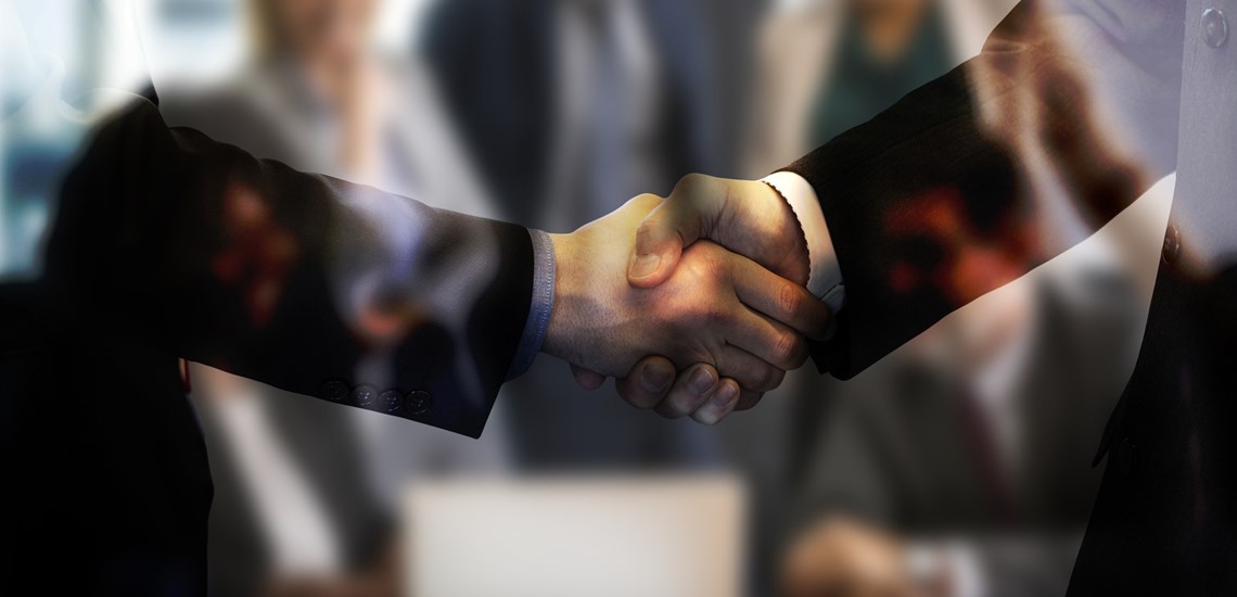 business persons handshake