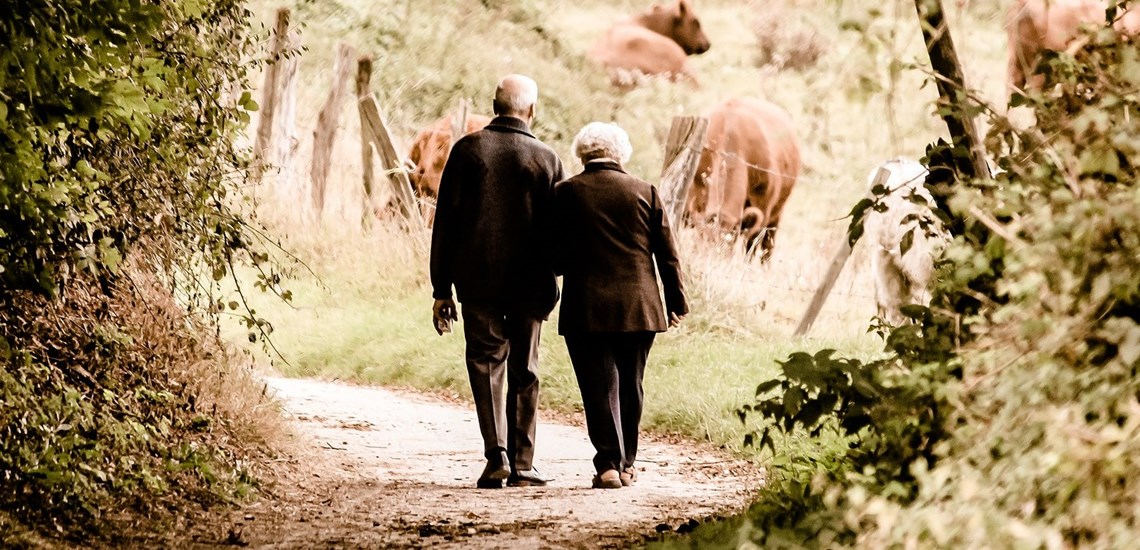 Couple walking in woods