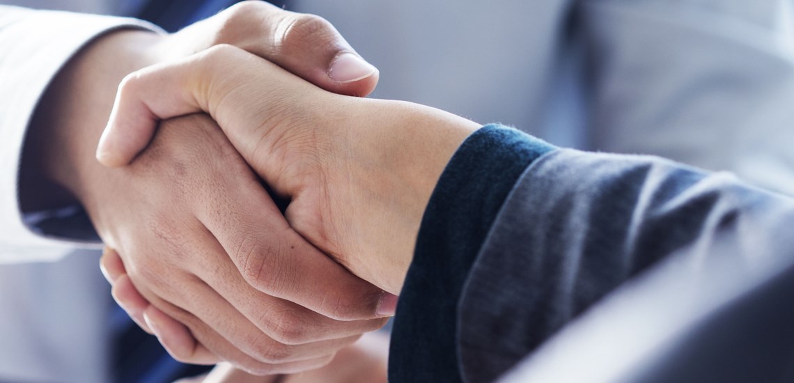 Shaking hands in business
