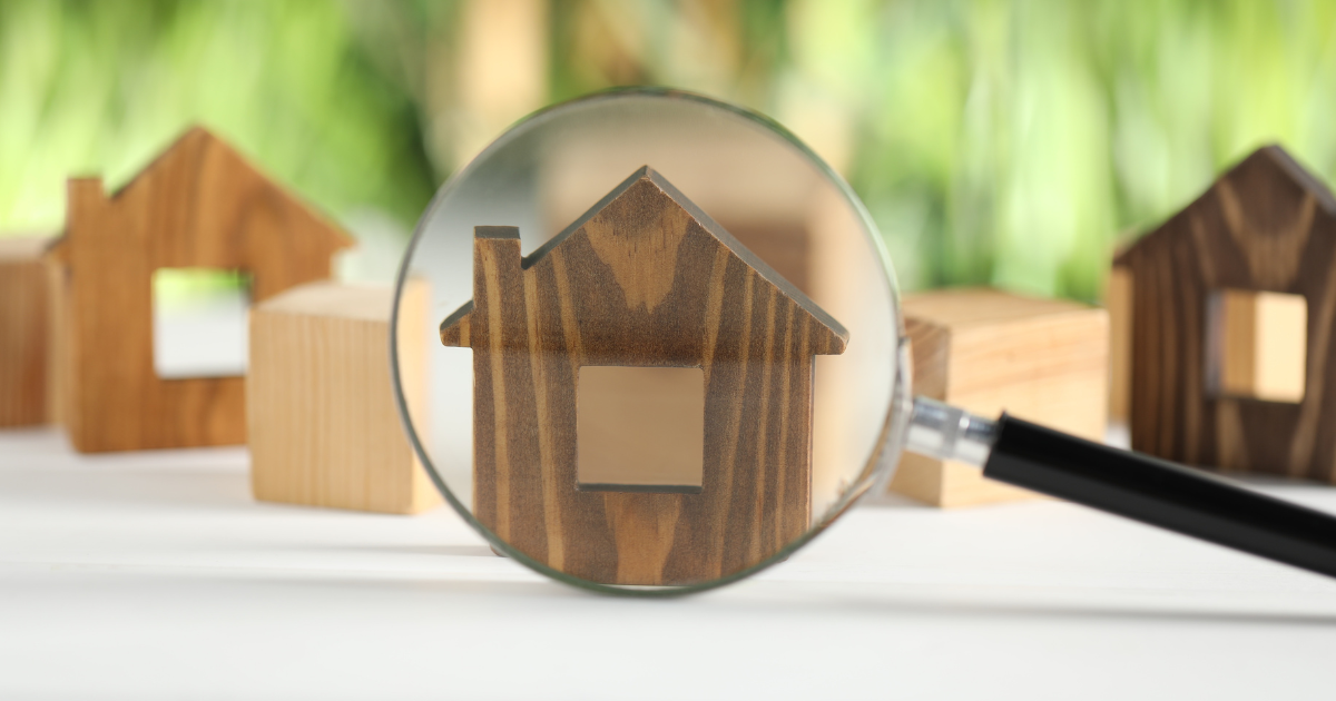 property hunting, using a magnifying glass